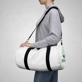 woman carrying serenity duffel bag